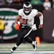Jalen Hurts of the Philadelphia Eagles runs the ball during the fourth quarter in the game against the New York Jets, and we offer new U.S. bettors our exclusive bet365 bonus code.