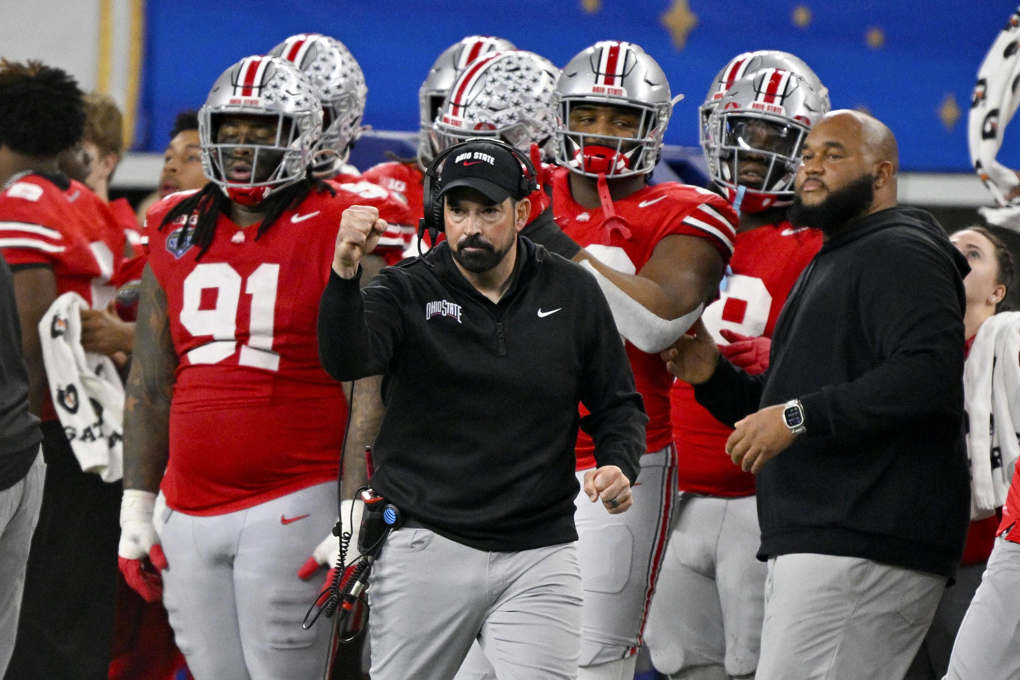 Ohio State head coach Ryan Day celebrates against Texas. We highlight Day in our Ohio State football preview.