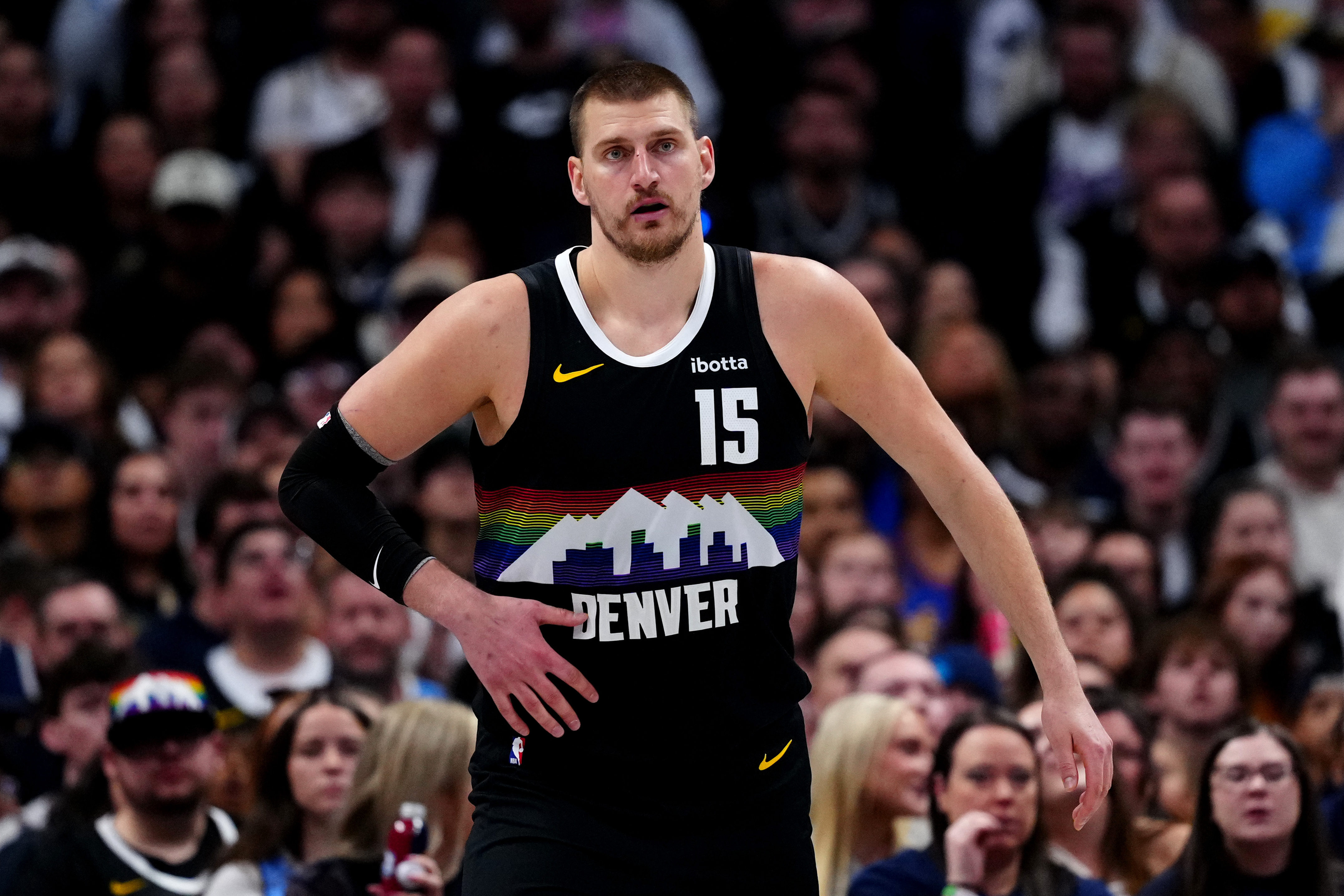 Denver Nuggets center Nikola Jokic (15), seen here looking on during a game, is featured in our Nuggets vs. Timberwolves player props for Game 3 today.