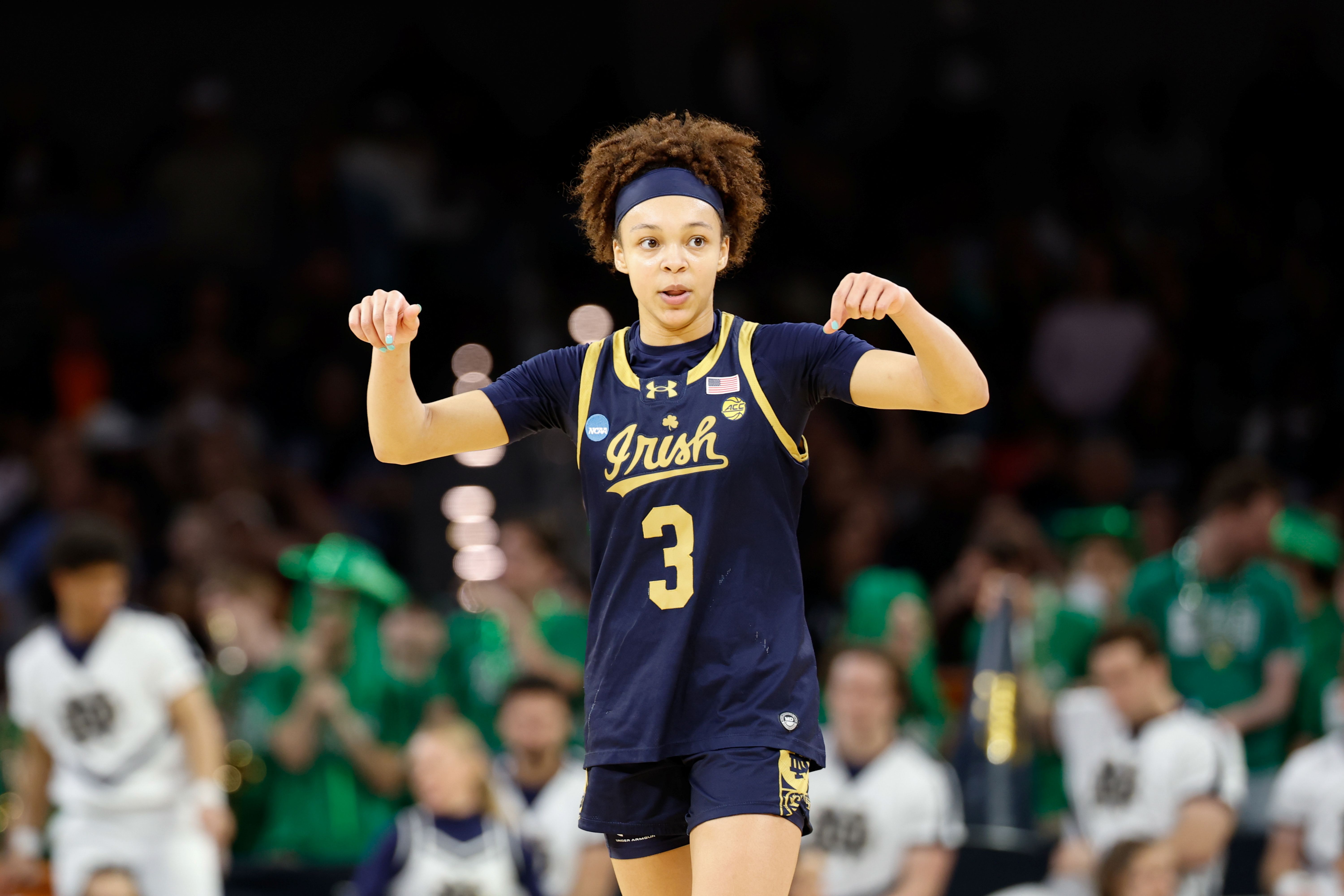 Notre Dame Fighting Irish guard Hannah Hidalgo reacts, and she's central as we look at our UConn vs. Notre Dame prediction.