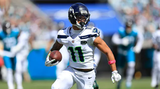 Seattle Seahawks wide receiver Jaxon Smith-Njigba rushes as we look at our Seahawks vs. Commanders player props