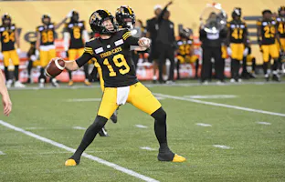 Hamilton Tiger-Cats quarterback Bo Levi Mitchell throws a touchdown pass in the third quarter against the Saskatchewan Roughriders. We expect a lot of points in our Tiger-Cats vs. Redblacks Prediction. 