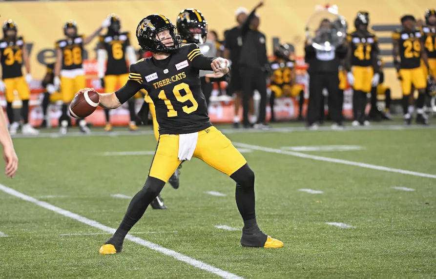 Hamilton Tiger-Cats quarterback Bo Levi Mitchell throws a touchdown pass in the third quarter against the Saskatchewan Roughriders. We expect a lot of points in our Tiger-Cats vs. Redblacks Prediction.