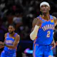 Shai Gilgeous-Alexander of the Oklahoma City Thunder celebrates scoring a 3-pointer against the Miami Heat during the fourth quarter at Kaseya Center as we look at our Thunder-Bucks NBA player props.