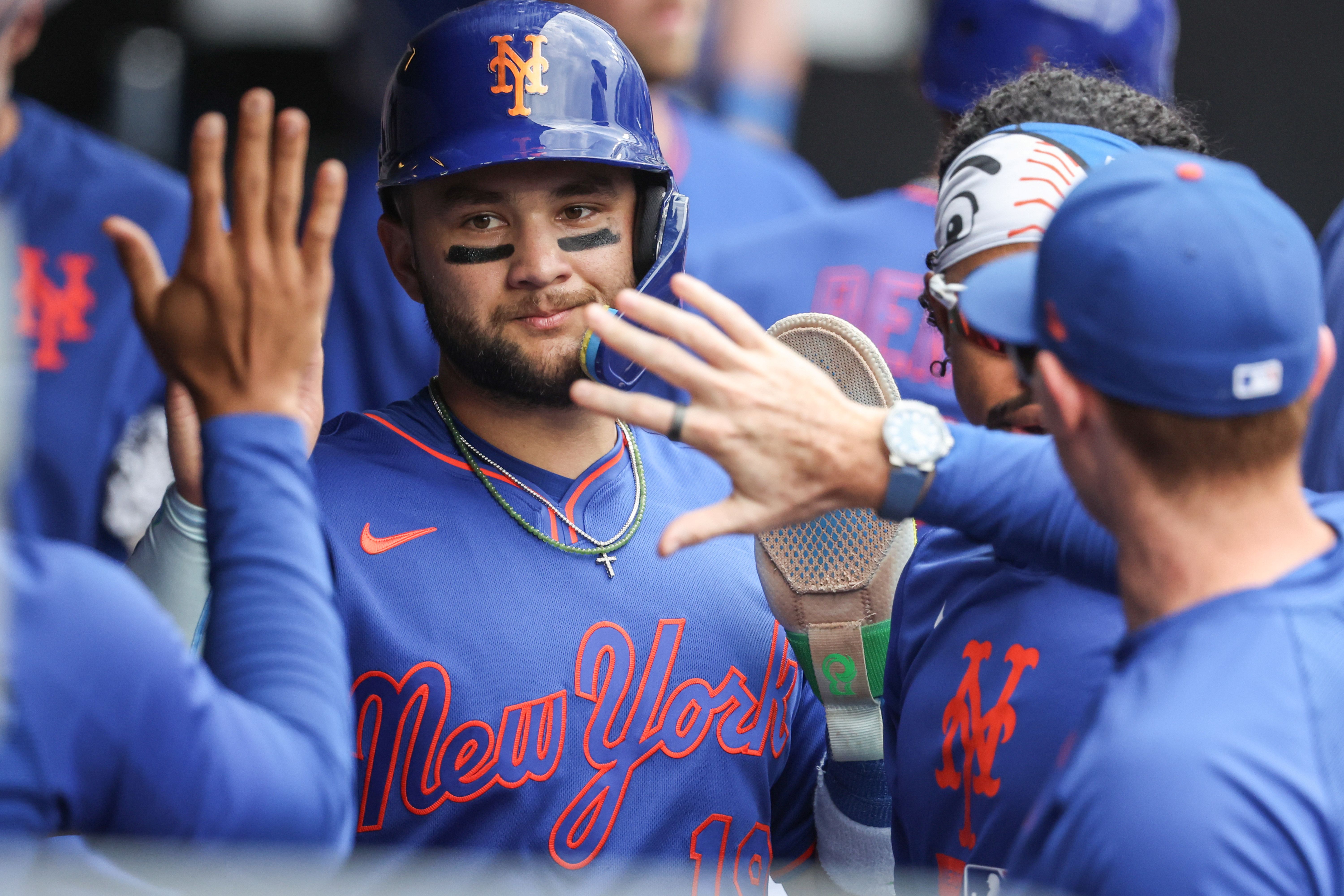 New York Mets shortstop Bo Bichette is greeted in the dugout after scoring, and he's key as we look at the Mets vs. Phillies win probability.