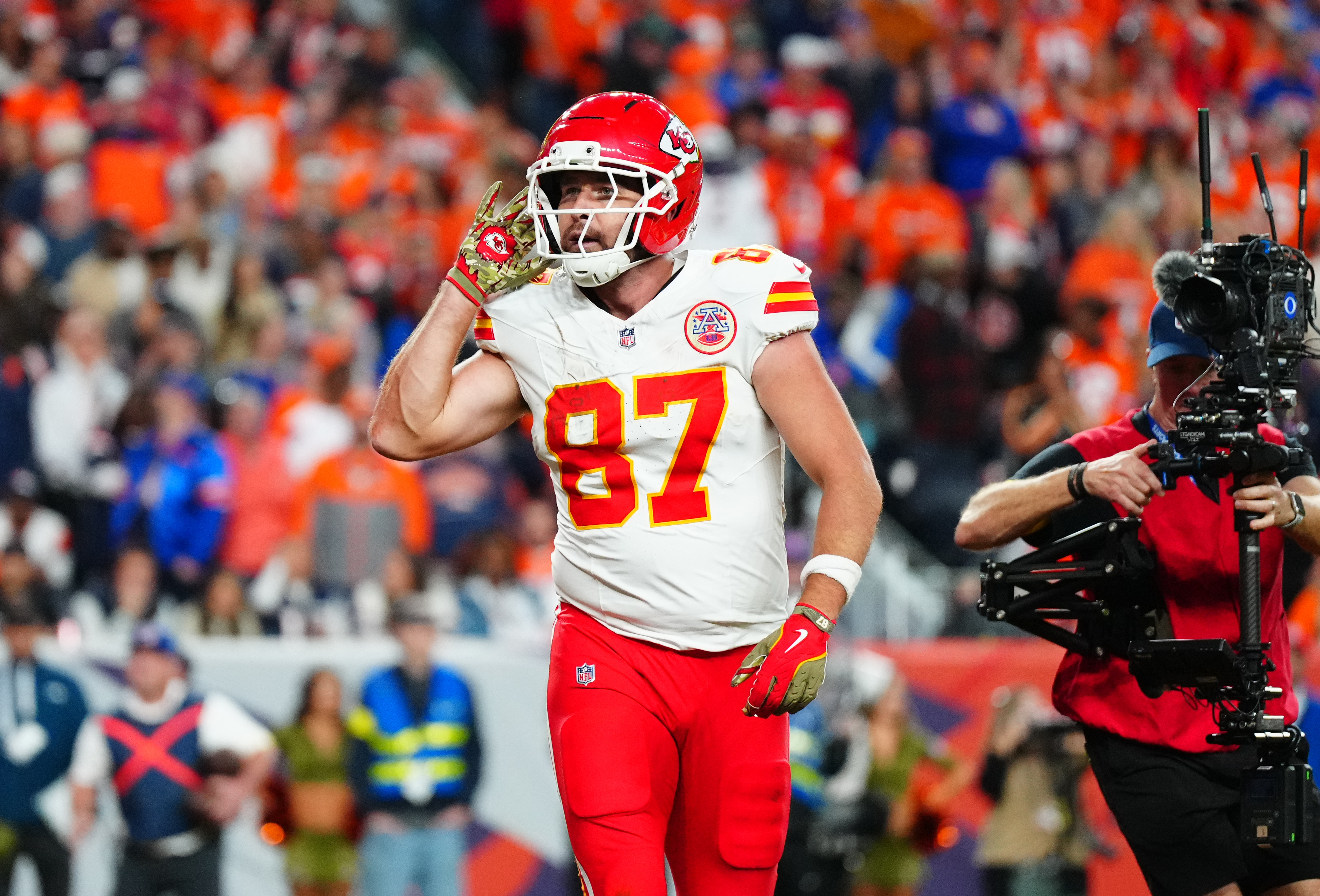 Kansas City Chiefs tight end Travis Kelce (87) reacts after a touchdown as we offer our Broncos vs. Chiefs predictions.