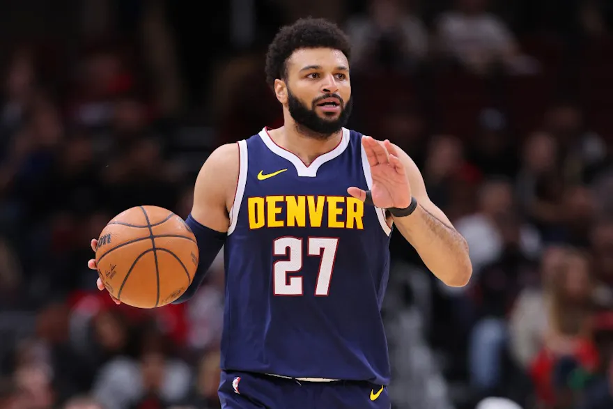 Jamal Murray of the Denver Nuggets dribbles up the court against the Chicago Bulls during the first half at the United Center as we look at our Celtics-Nuggets NBA prop picks.