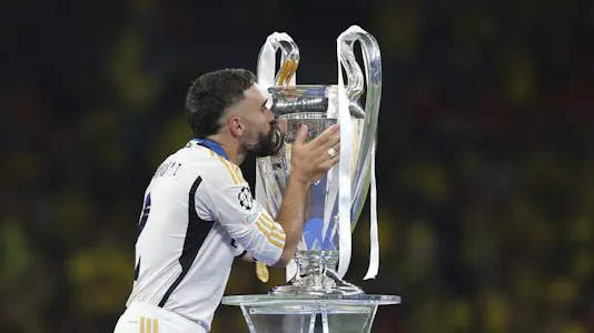 Real Madrid's Dani Carvajal kisses the cup as we look at the partnership between bet365 and UEFA Champions League.