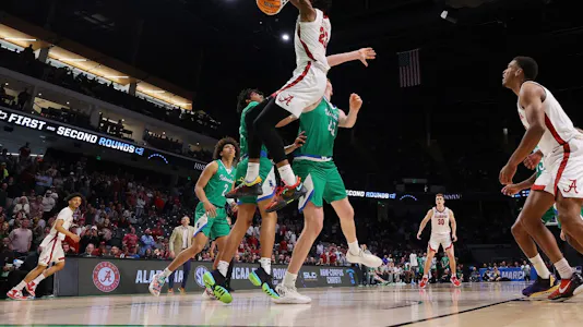 Nick Pringle of the Alabama Crimson Tide dunks as we look at the best March Madness odds