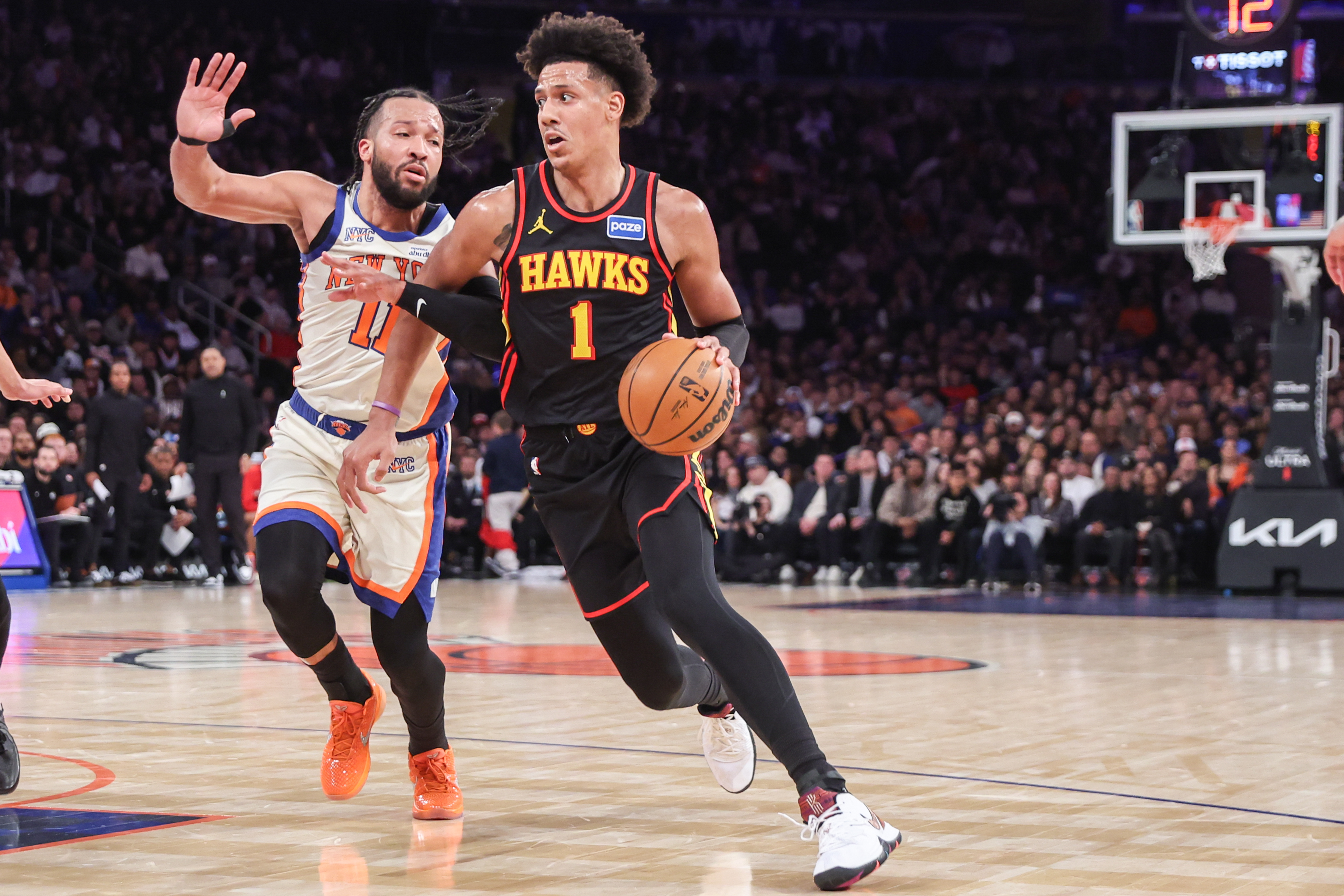 Atlanta Hawks forward Jalen Johnson (1) drives past New York Knicks guard Jalen Brunson (11) in the third quarter at Madison Square Garden.