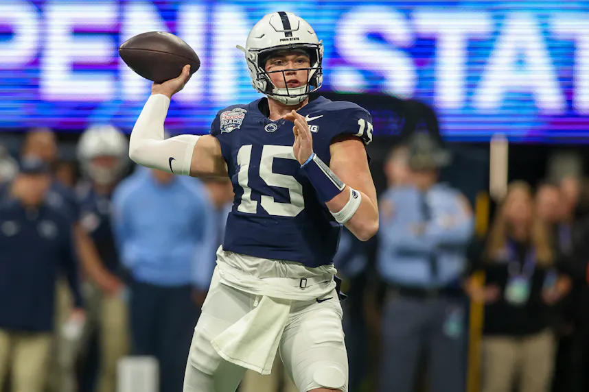 Penn State Nittany Lions quarterback Drew Allar throws a pass against the Mississippi Rebels as we look at our Penn State vs. West Virginia predictions.