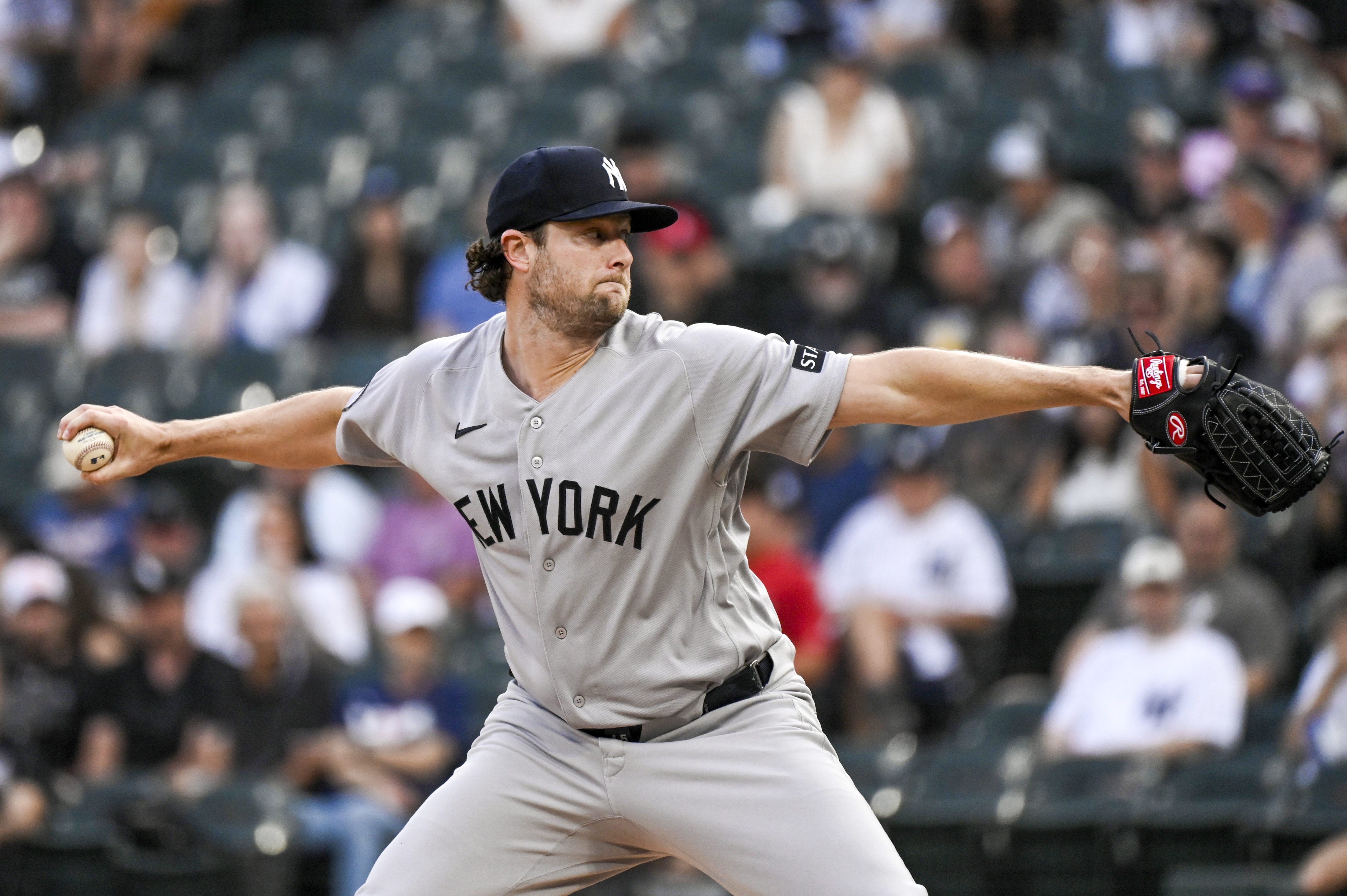 New York Yankees pitcher Gerrit Cole throws a pitch as we make our best Yankees vs. Cubs prediction.