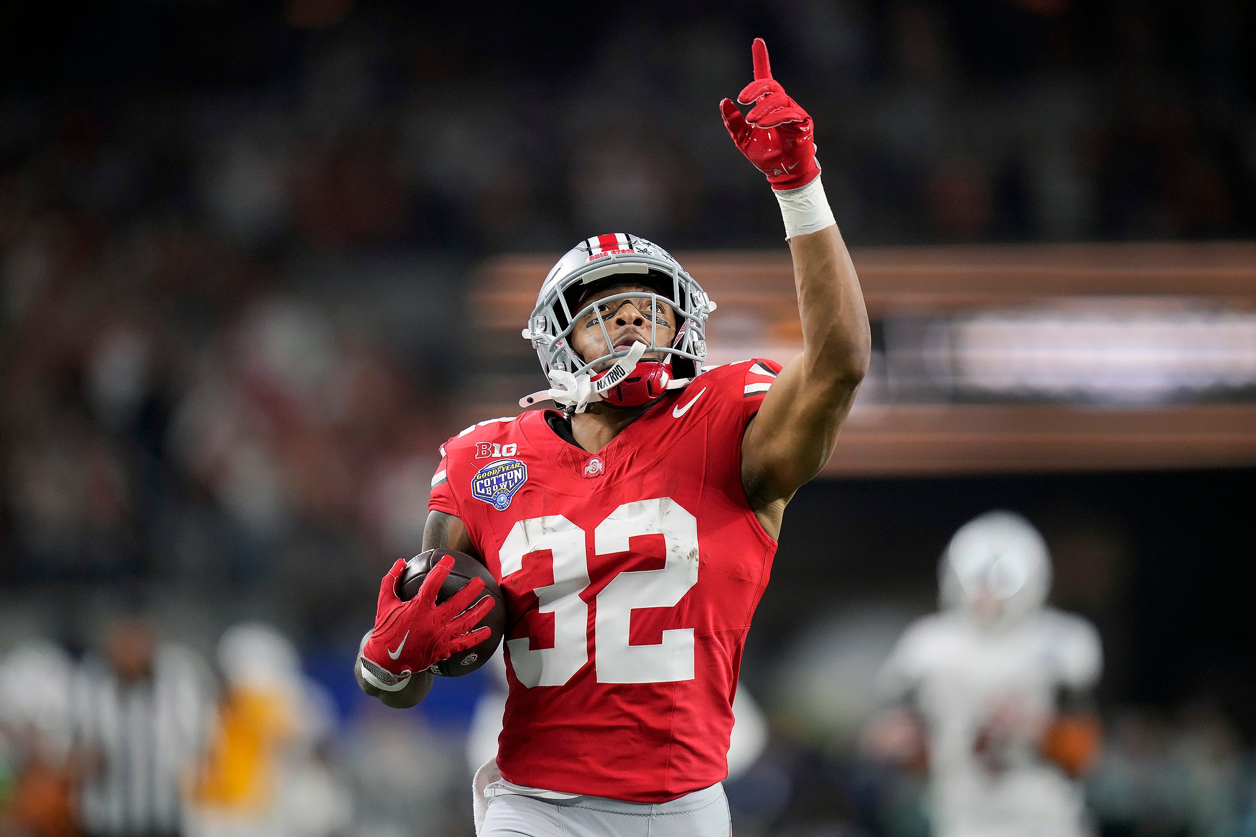 Ohio State running back TreVeyon Henderson scores a touchdown on a 75-yard touchdown catch and run against Texas in the College Football Playoff. We're backing Henderson in our Ohio State vs. Notre Dame player prop picks. 