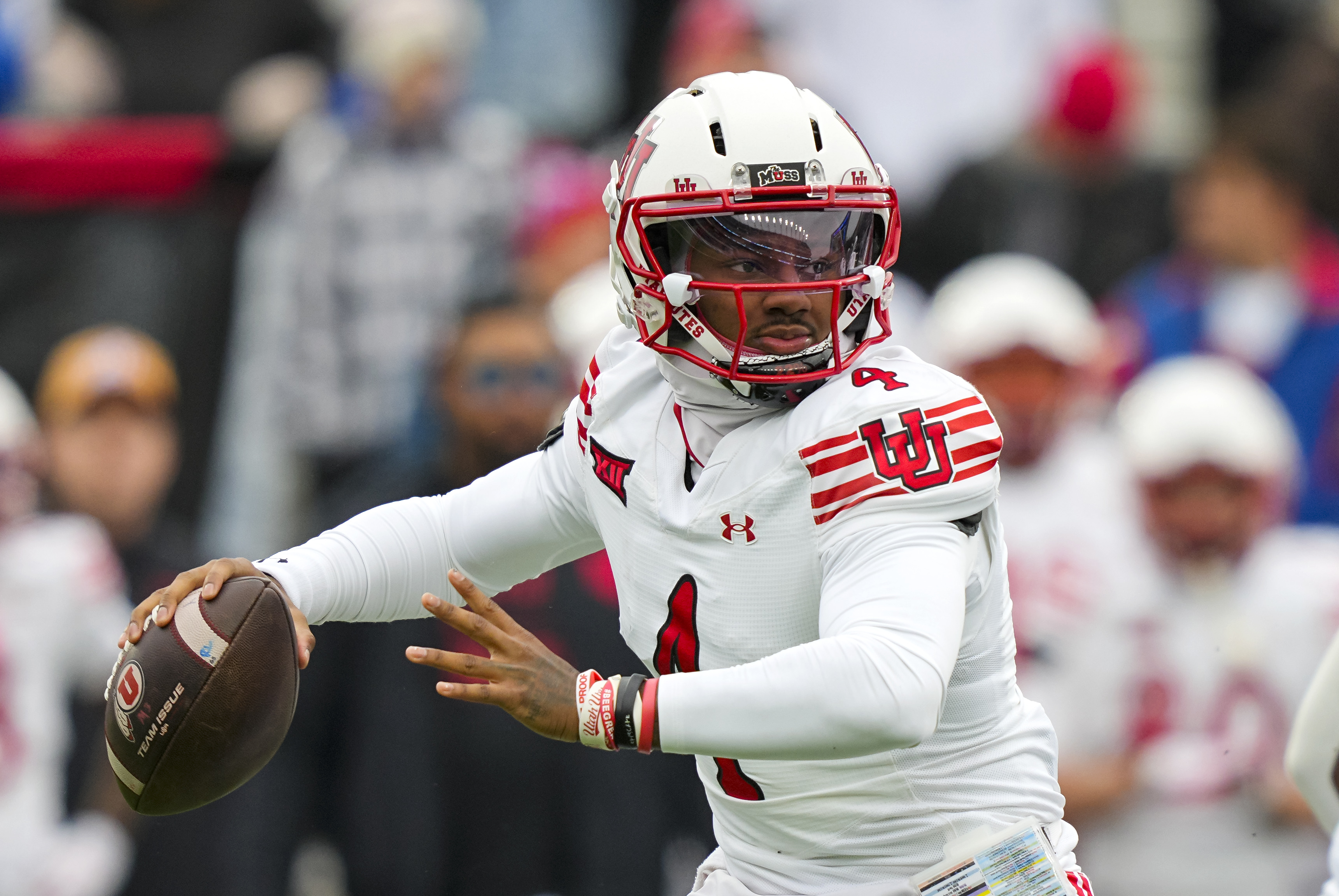 Utah Utes quarterback Devon Dampier throws a pass as we make our best Nebraska vs. Utah predictions.