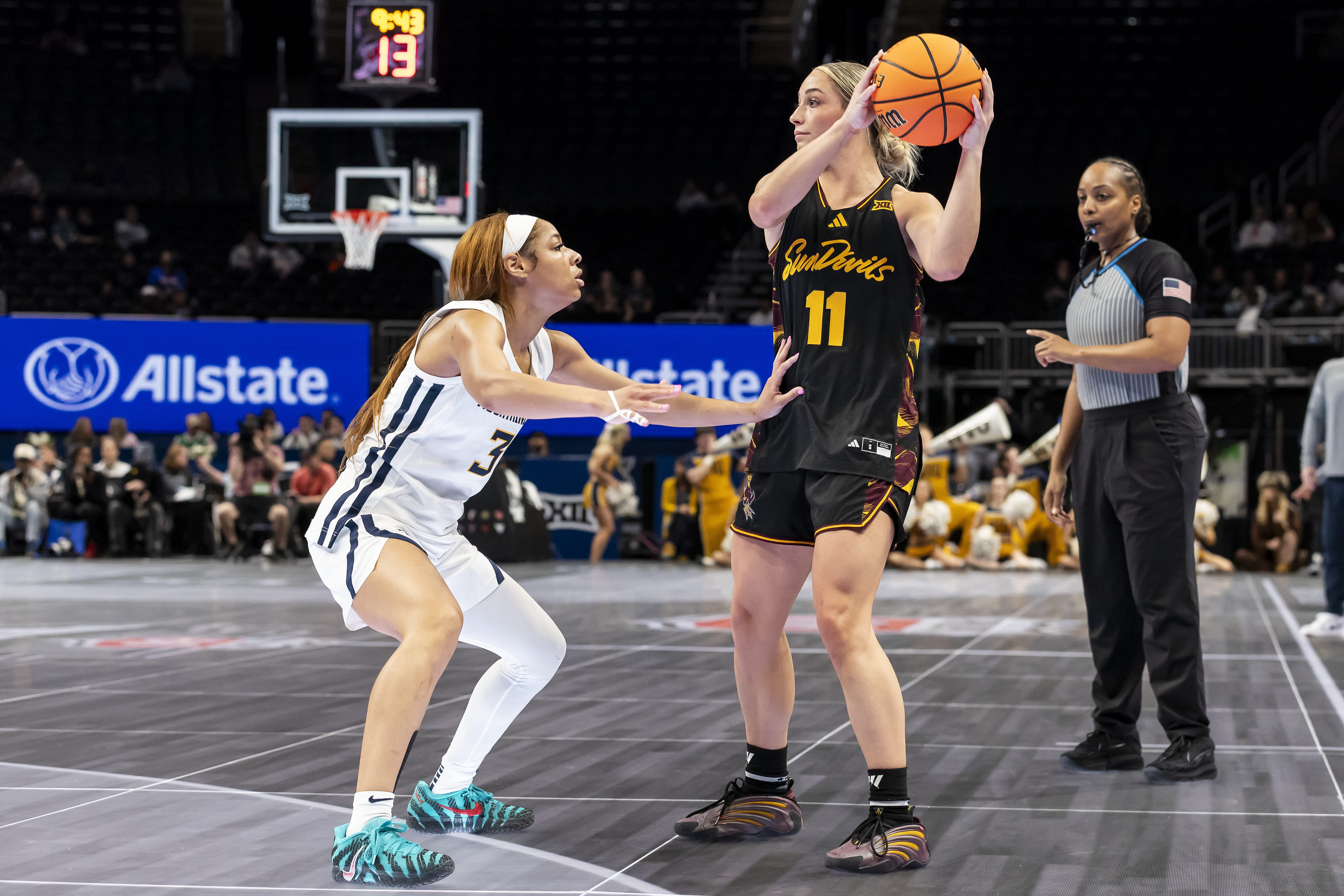 Arizona State guard Marley Washenitz (11), featured in our Arizona State vs. Virginia prediction, attempts a pass during the Big 12 Tournament.