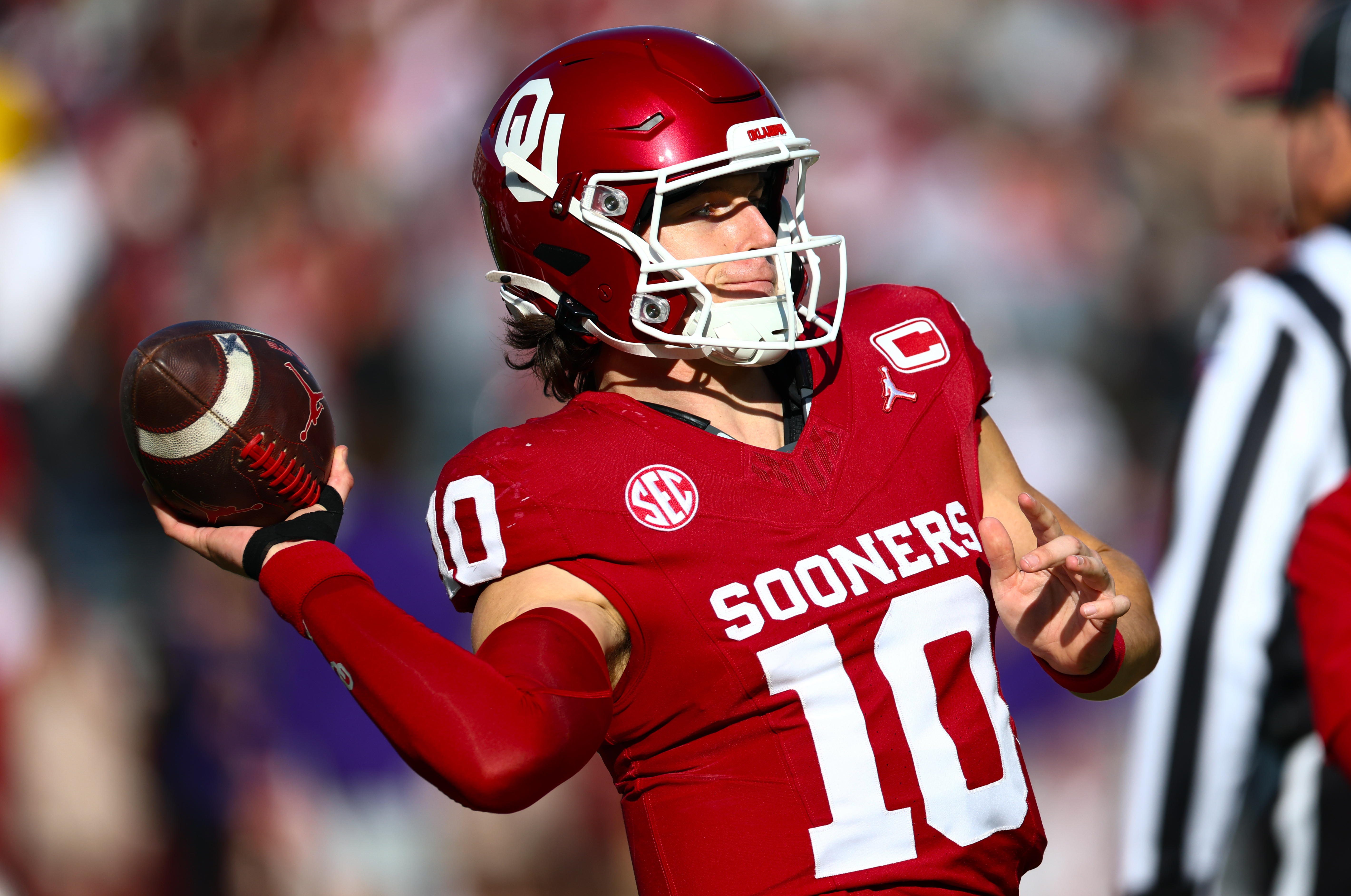 Oklahoma Sooners quarterback John Mateer (10) warms up as part of our Alabama vs. Oklahoma anytime touchdown scorer predictions.