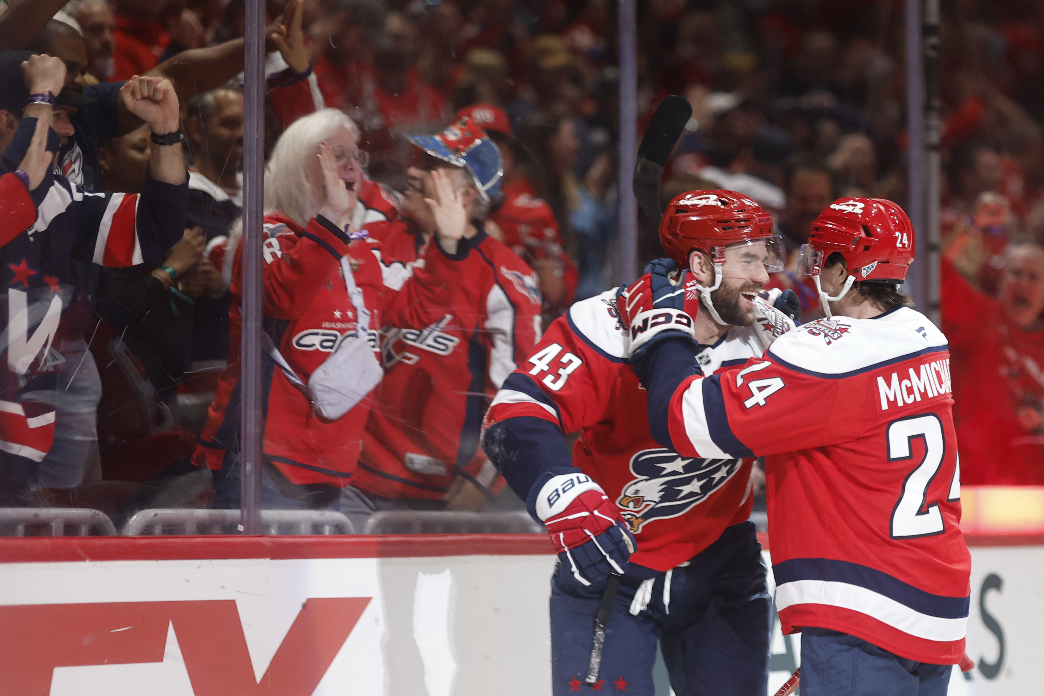 Capitals Tom Wilson celebrates with Connor McMichael as we make our best Penguins vs. Capitals prediction.