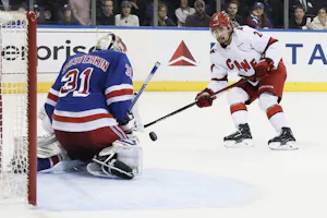 Igor Shesterkin (31) of the New York Rangers blocks a shot from Seth Jarvis (24) of the Carolina Hurricanes, as we offer our Rangers vs. Hurricanes expert picks and predictions for Saturday's Game 4 at PNC Arena in Raleigh, N.C.