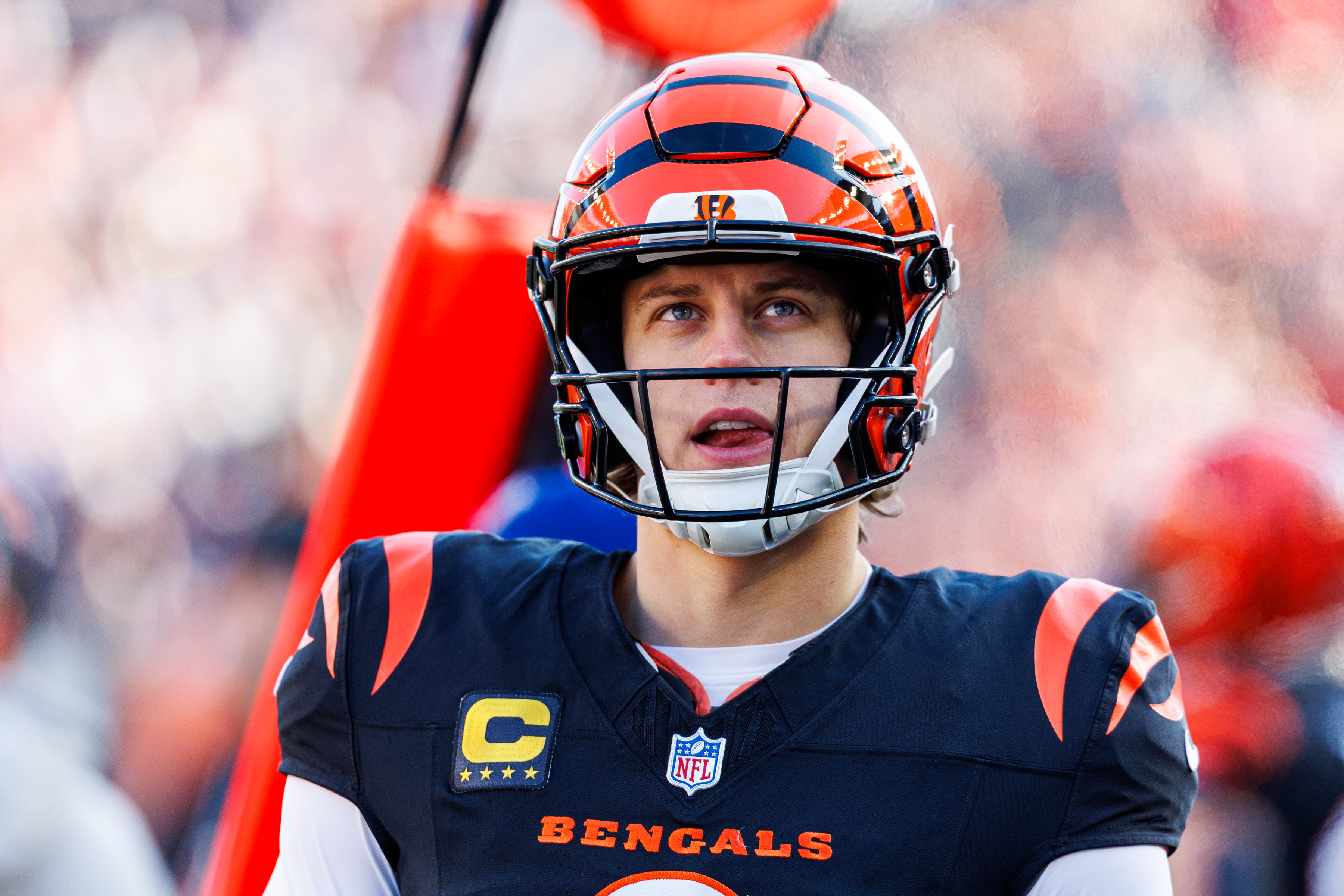 Cincinnati Bengals quarterback Joe Burrow (9), who is featured in our NFL MVP odds and predictions, looks on.