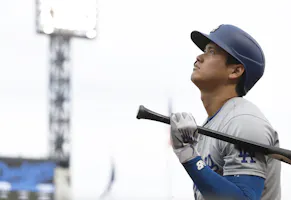 Los Angeles Dodgers designated hitter Shohei Ohtani in the on-deck circle against the Pittsburgh Pirates, and we look at the best Ohtani futures bets with the 2024 season well underway,