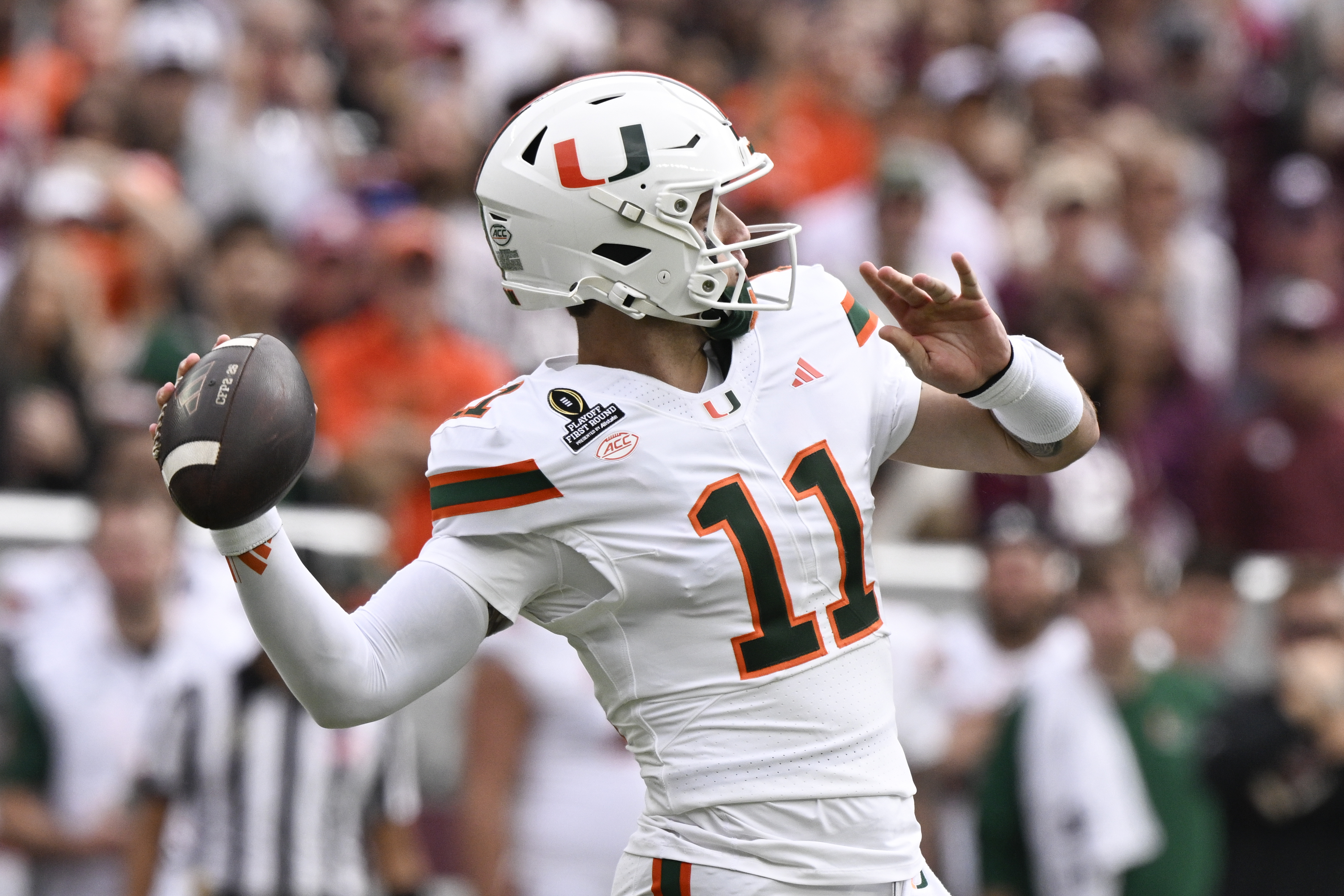 Miami quarterback Carson Beck (11) is the focus of our Miami vs. Ohio State player props for the College Football Playoff matchup in the Cotton Bowl.