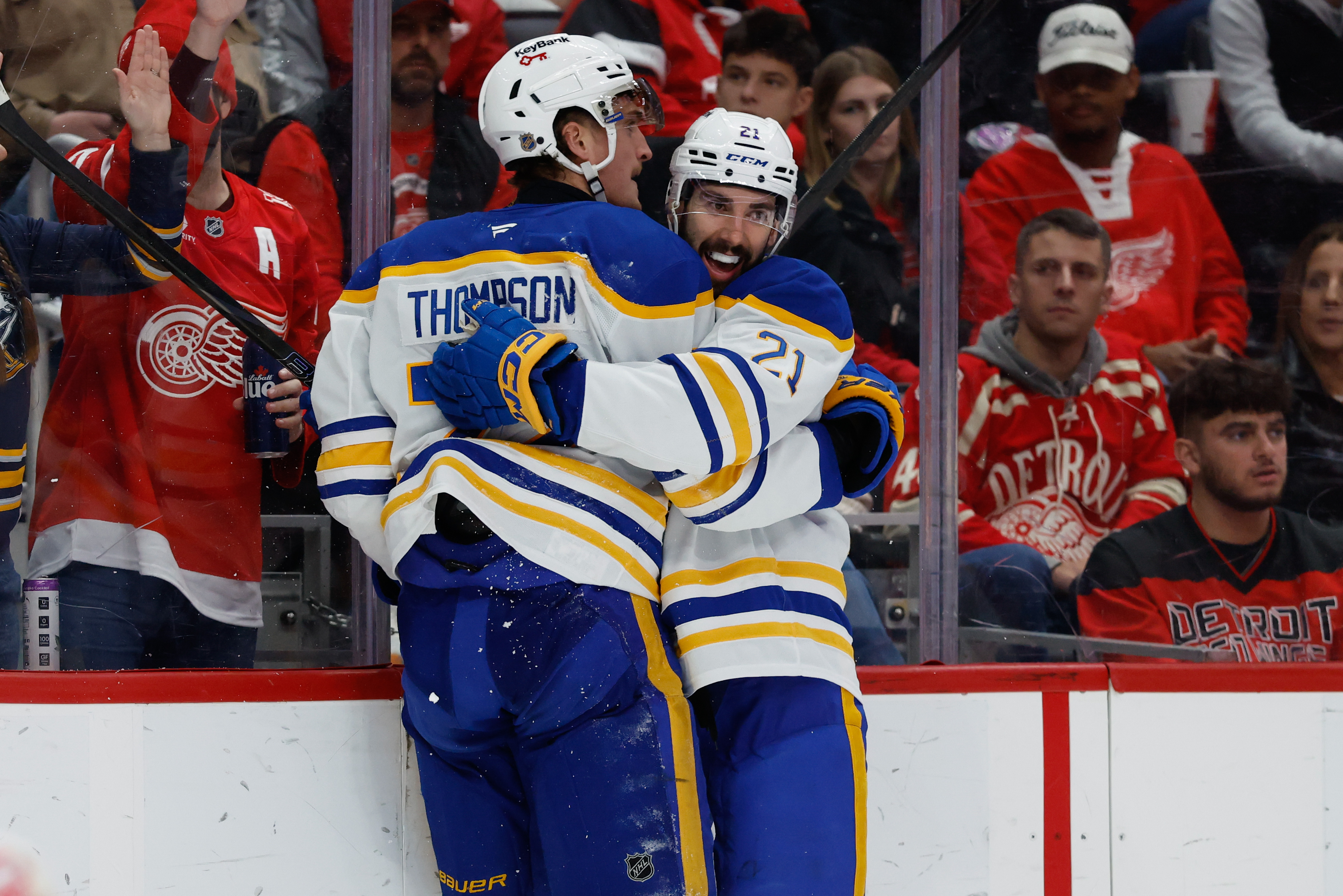 Buffalo Sabres center Tage Thompson receives congratulations from defenseman Conor Timmins as we make our best Red Wings vs. Sabres prediction.