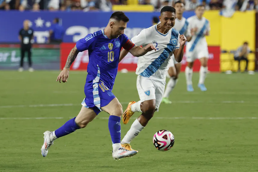 Argentina midfielder Lionel Messi dribbles the ball as Guatemala defender Jose Ardon chases in the second half at Commanders Field as we profile the best bets for the Copa America 2024 Group A opener between Argentina and Canada.