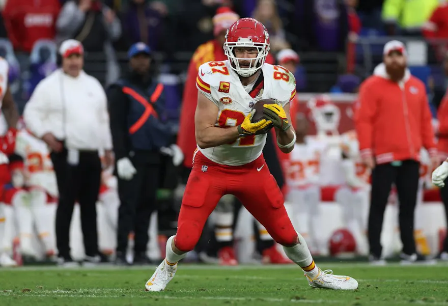 Travis Kelce #87 of the Kansas City Chiefs runs after catching a pass as we look at our Chiefs vs. 49ers parlay