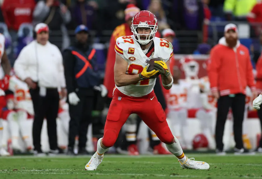 Travis Kelce #87 of the Kansas City Chiefs runs after catching a pass as we look at our Chiefs vs. 49ers parlay