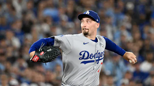 Los Angeles Dodgers pitcher Blake Snell (7) throws a pitch in the World Series as we offer our Blue Jays vs. Dodgers same-game parlay.