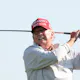 Former President Donald Trump follows his tee shot during the pro-am prior to the LIV Golf Invitational - DC at Trump National Golf Club as we look at our Donald Trump presidential odds for 2024.