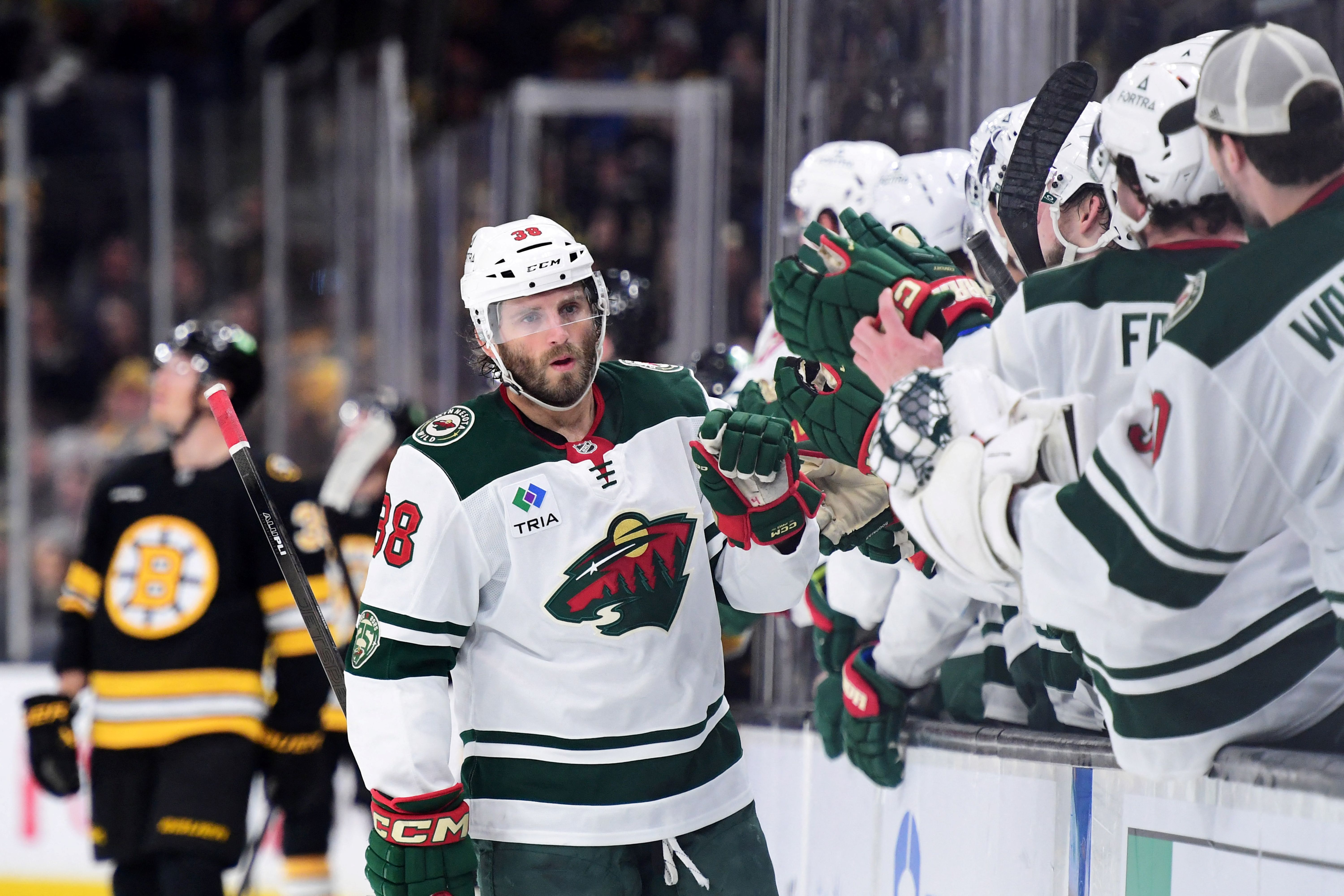Minnesota Wild right wing Ryan Hartman is congratulated by his teammates, and he's key as we look at our Avalanche vs. Wild prediction.