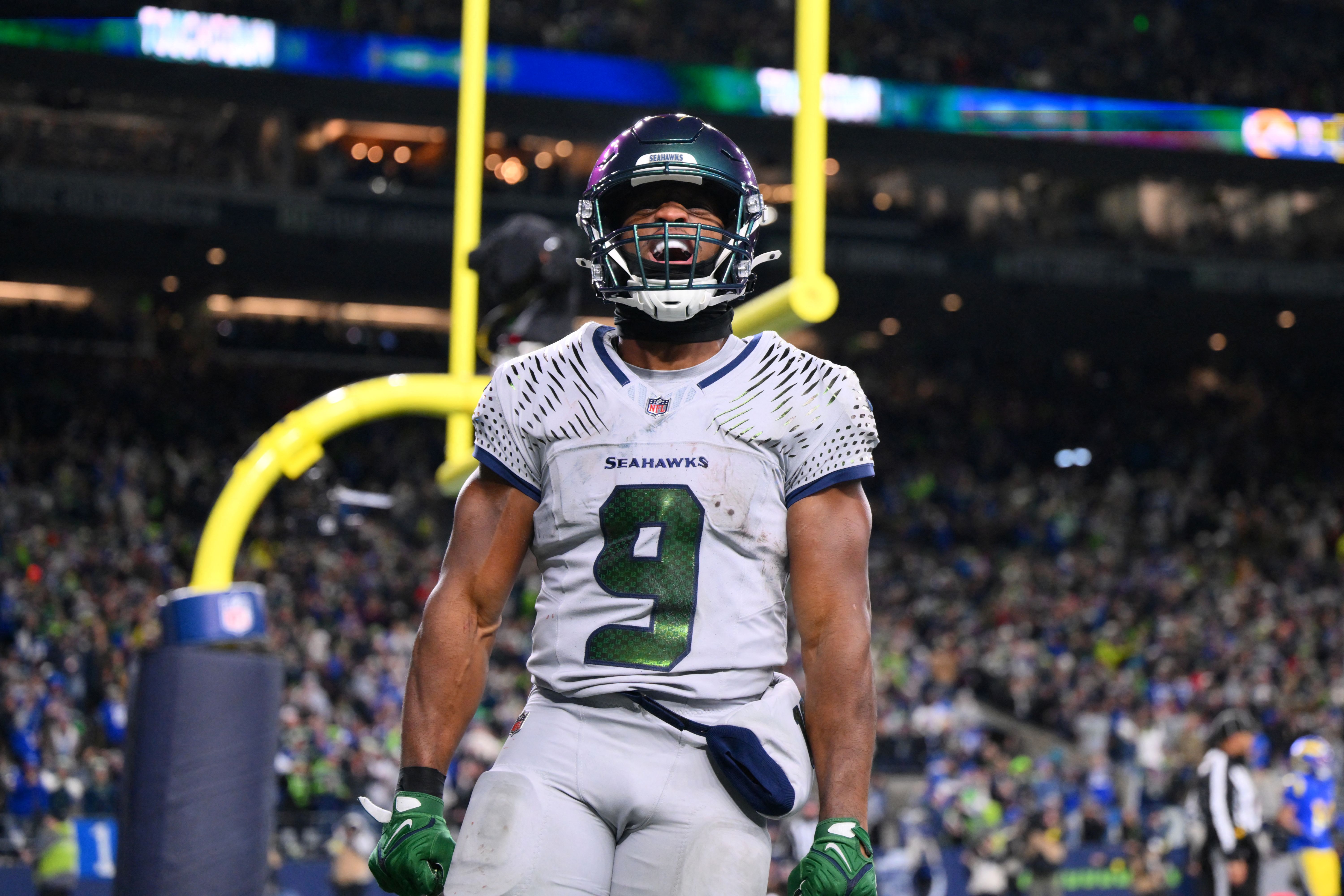 Seattle Seahawks running back Kenneth Walker III celebrates after scoring a touchdown as we look at our NFL best bets for the Conference Championships.