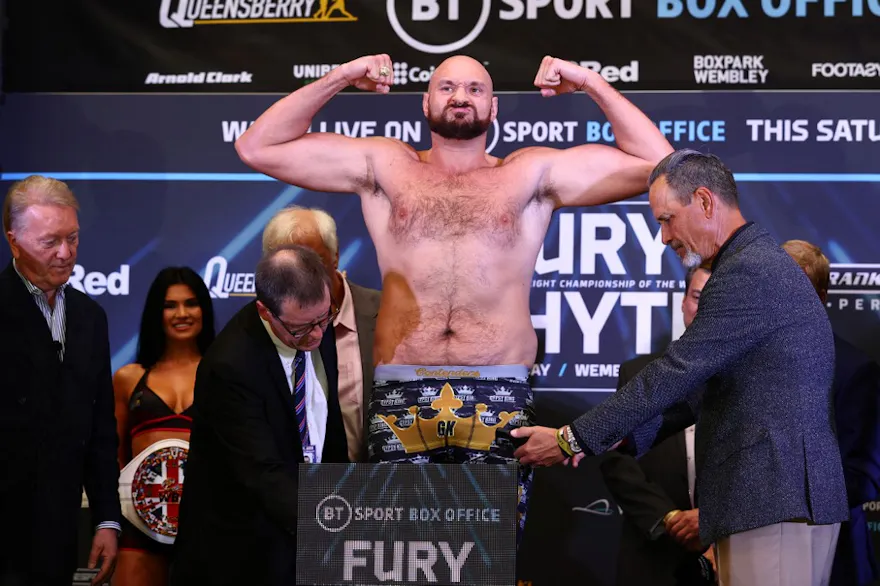 World Boxing Council heavyweight title holder Britain's Tyson Fury reacts during his weigh-in at the Wembley Stadium, in London, on April 22, 2022 on the eve of his fight against Dillian Whyte as we look at our Fury-Ngannou prediction.