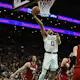 Jayson Tatum of the Boston Celtics goes to the basket as we look at the best NBA Finals MVP odds
