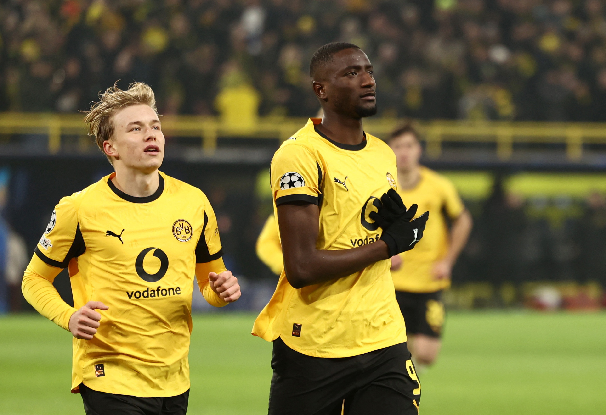 Serhou Guirassy celebrates scoring a goal as we offer our Borussia Dortmund vs. Tottenham prediction.