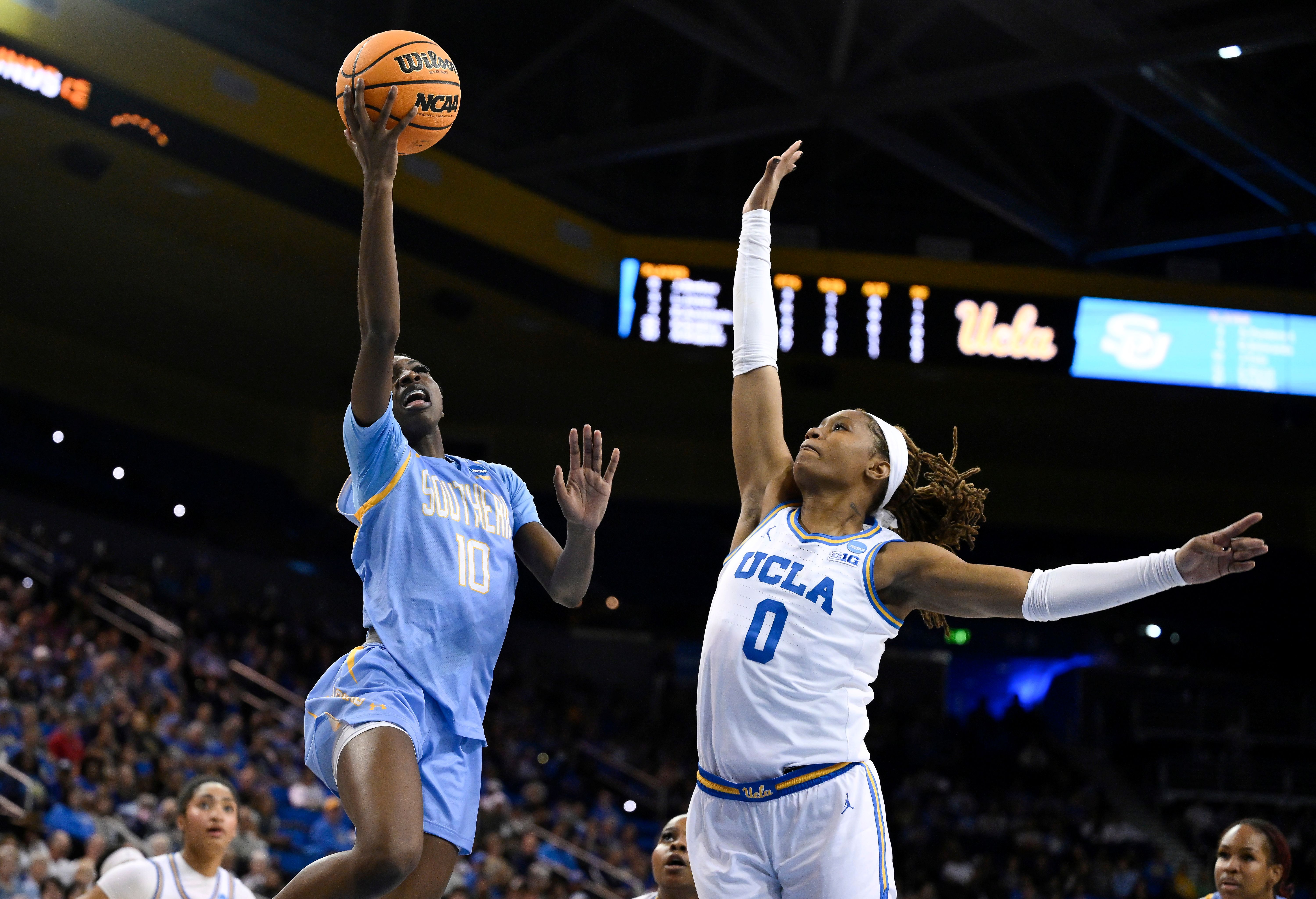 Southern Lady Jaguars guard Jocelyn Tate drives to the basket as we make our best Samford vs. Southern prediction.