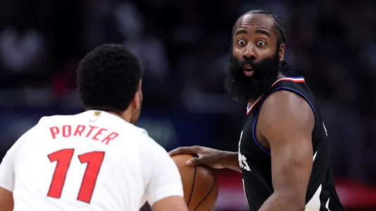 James Harden #1 of the LA Clippers looks to pass as Jontay Porter #11 of the Toronto Raptors defends during the second half of a game as we look at the betting probe allegedly involving Porter.  