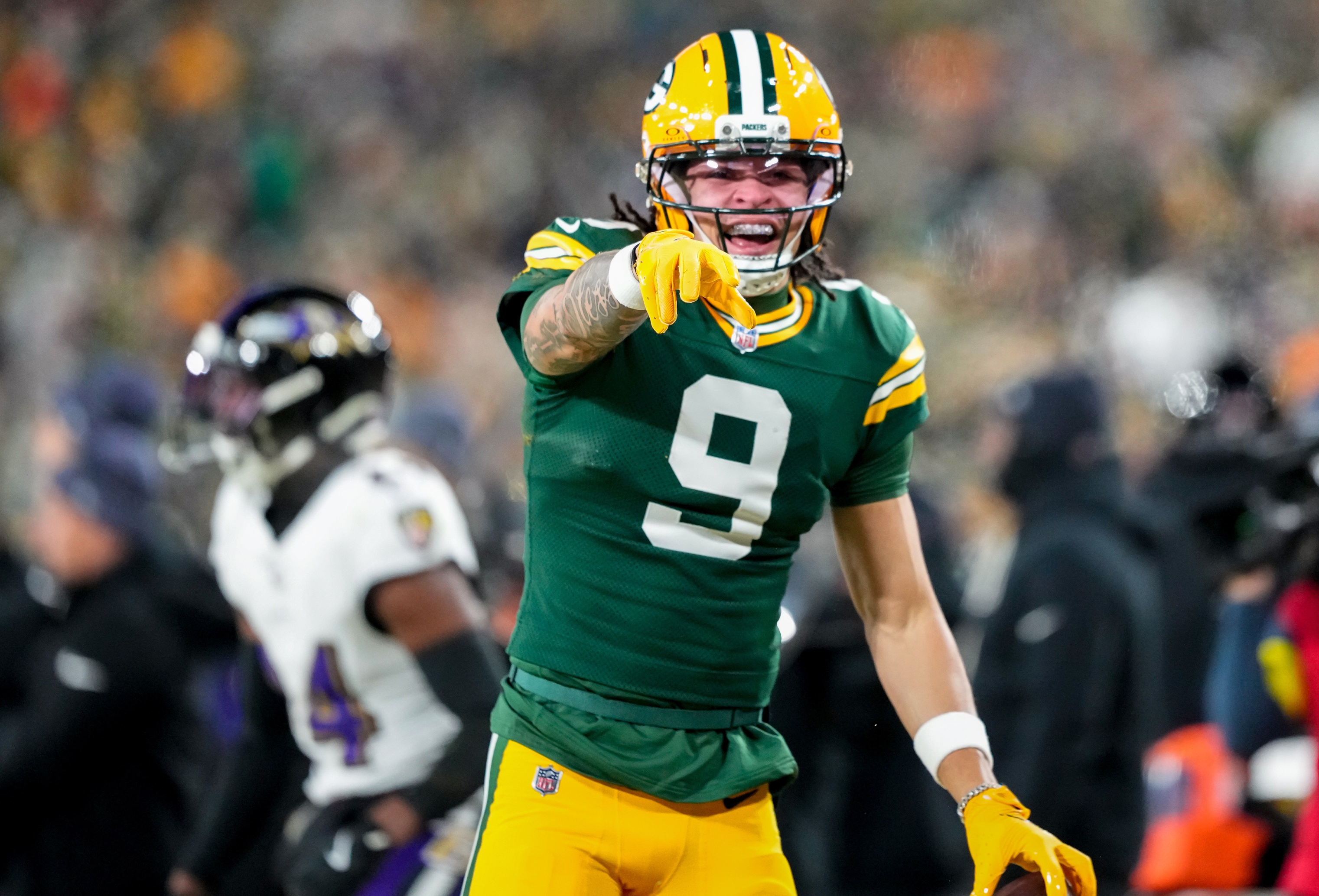 Green Bay Packers wide receiver Christian Watson celebrates as we make our best NFL upset picks for Wild Card Round.