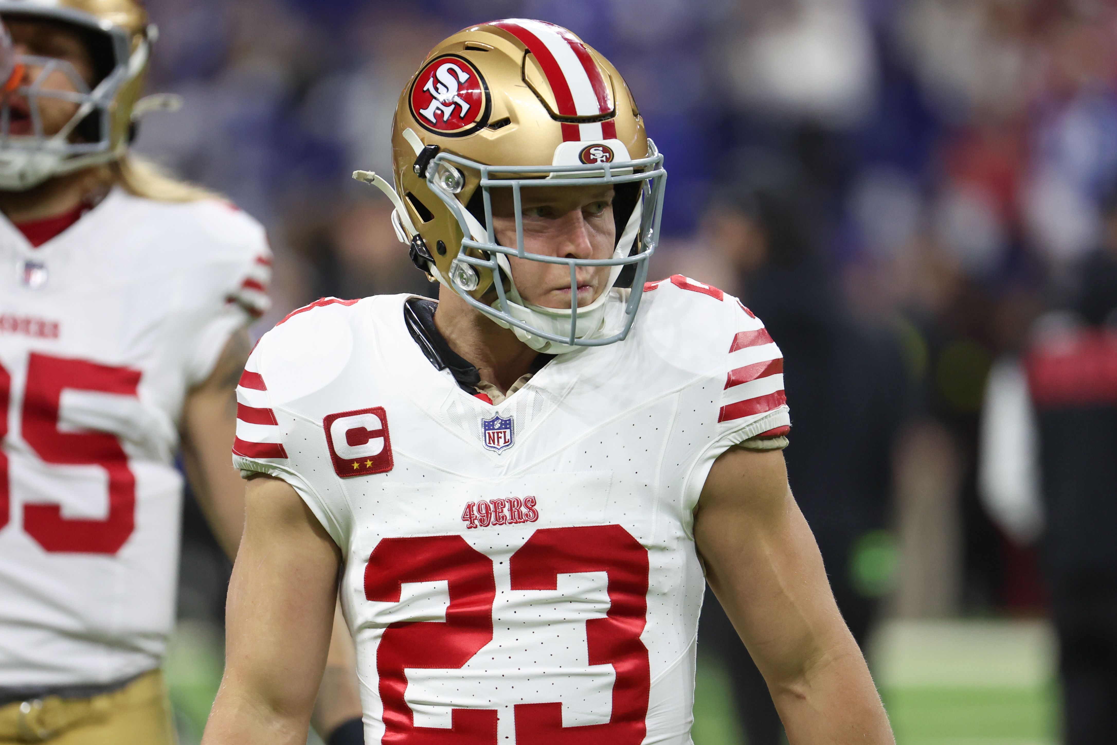San Francisco 49ers running back Christian McCaffrey (23) looks on as we break down the NFL Comeback Player of the Year odds.