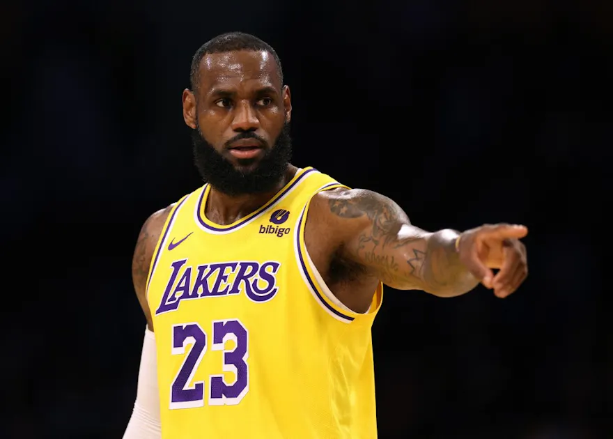 LeBron James of the Los Angeles Lakers directs the defense as we look at the Lakers-Pistons Caesars bonus code.