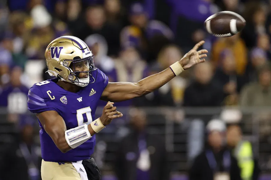 Michael Penix Jr. of the Washington Huskies passes as we look at the best Heisman Trophy odds