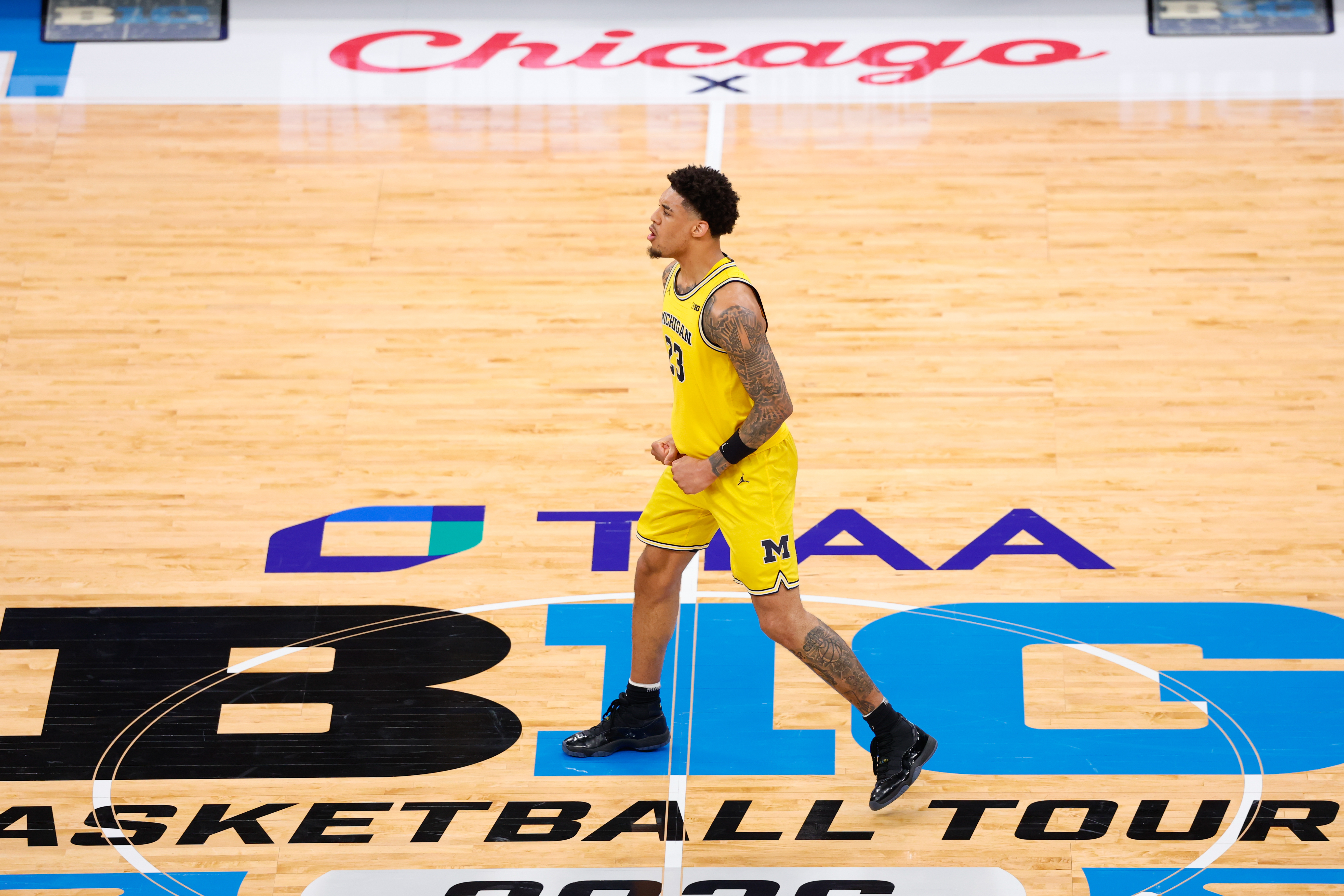 Michigan Wolverines forward Yaxel Lendeborg (23) reacts to a play as we break down our Howard vs. Michigan prediction.