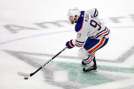 Connor McDavid skates with the puck against the Dallas Stars as Gary Pearson dives into his best props and predictions for Sunday's Western Conference Final Game 6 between the Stars and Oilers. 