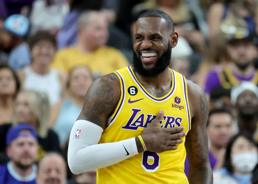 LeBron James of the Los Angeles Lakers laughs during a game against the Phoenix Suns, and we offer new U.S. bettors our exclusive bet365 bonus code.