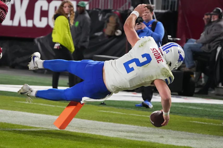 SMU Mustangs quarterback Preston Stone runs with the ball as we look at our best Week 0 college football parlay.