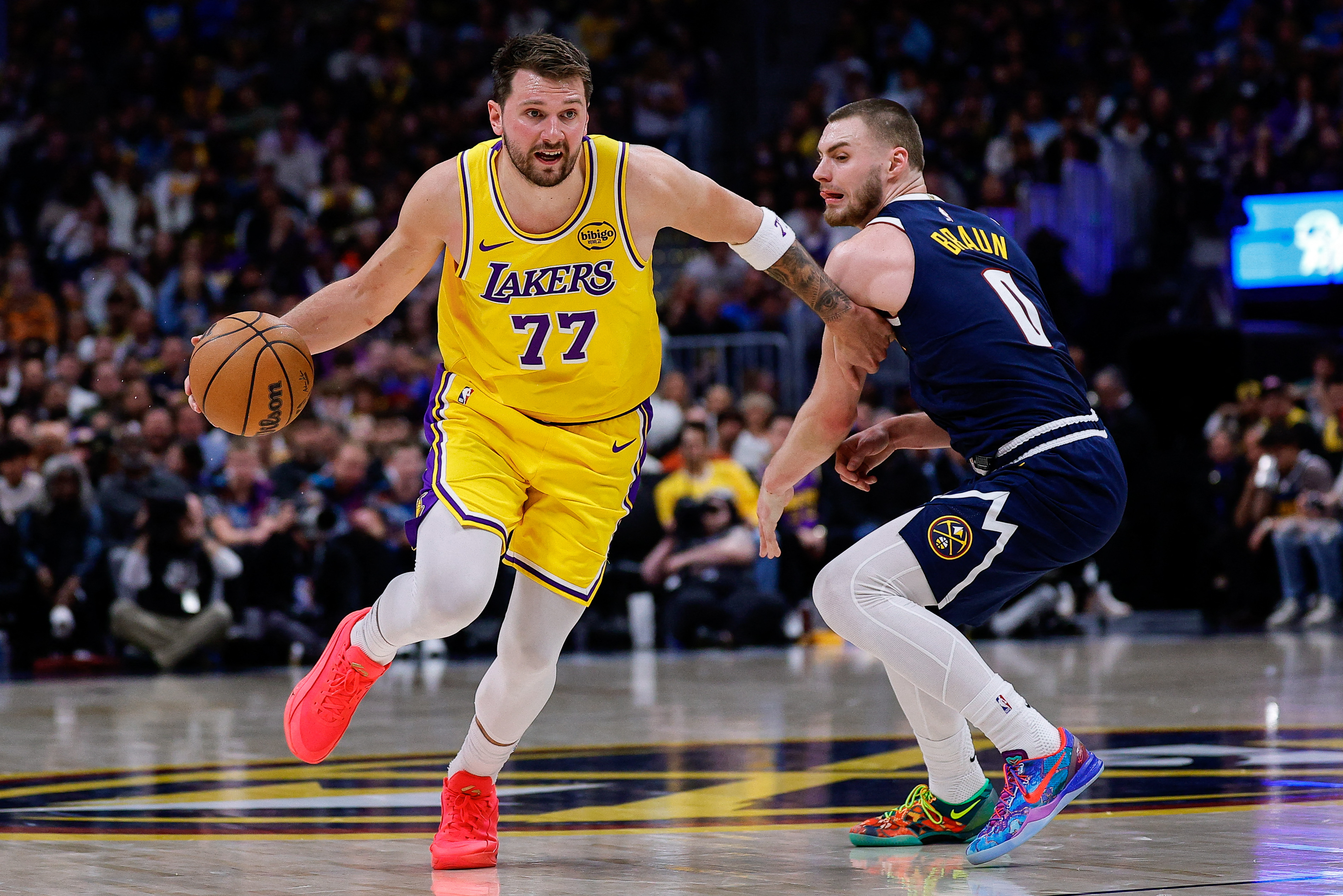 Los Angeles Lakers guard Luka Doncic (77) controls the ball as we look at our Knicks vs. Lakers player props