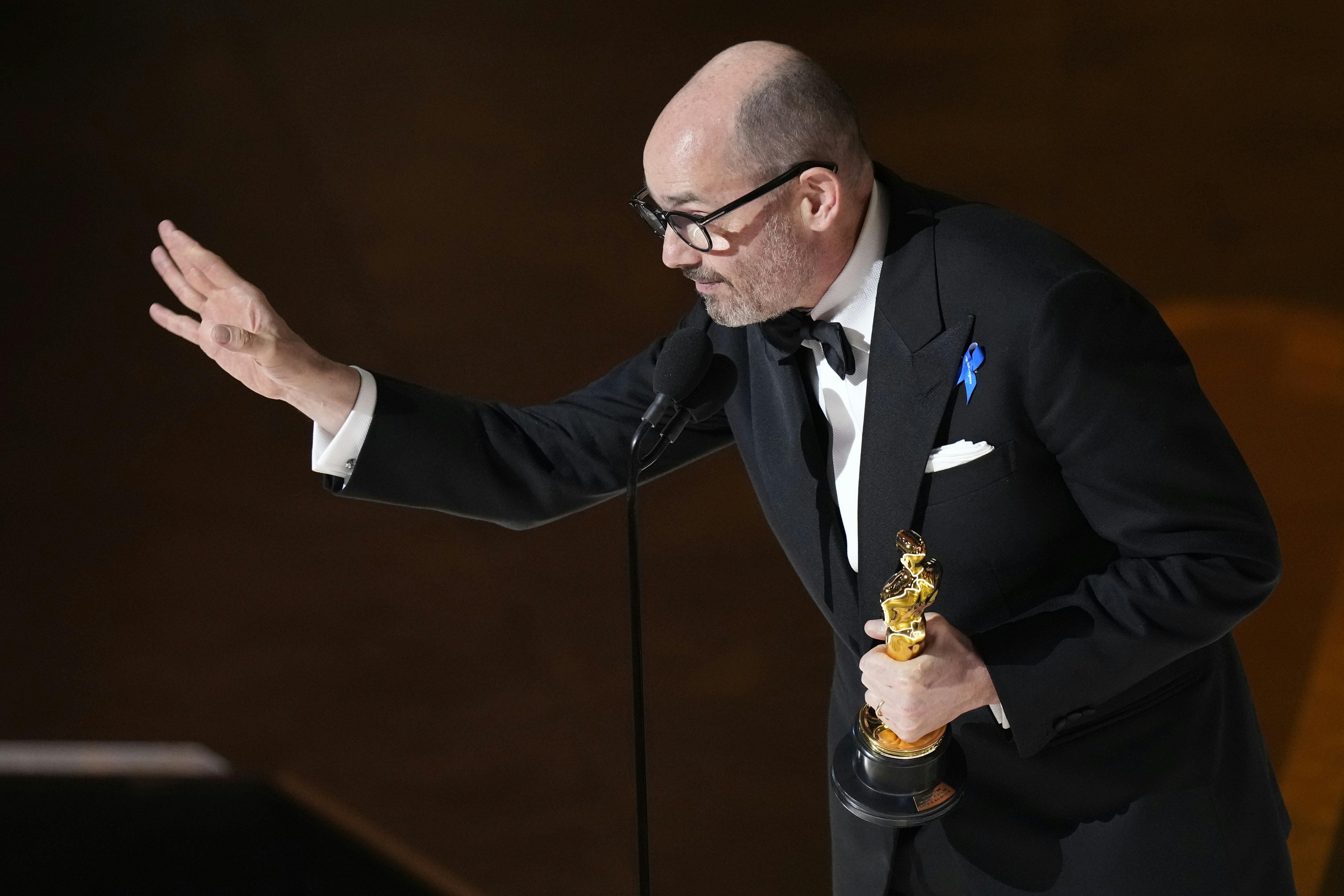 Edward Berger accepts the award for best international feature film for "All Quiet on the Western Front" from Germany during the 95th Academy Awards at the Dolby Theatre at Ovation Hollywood in Los Angeles.