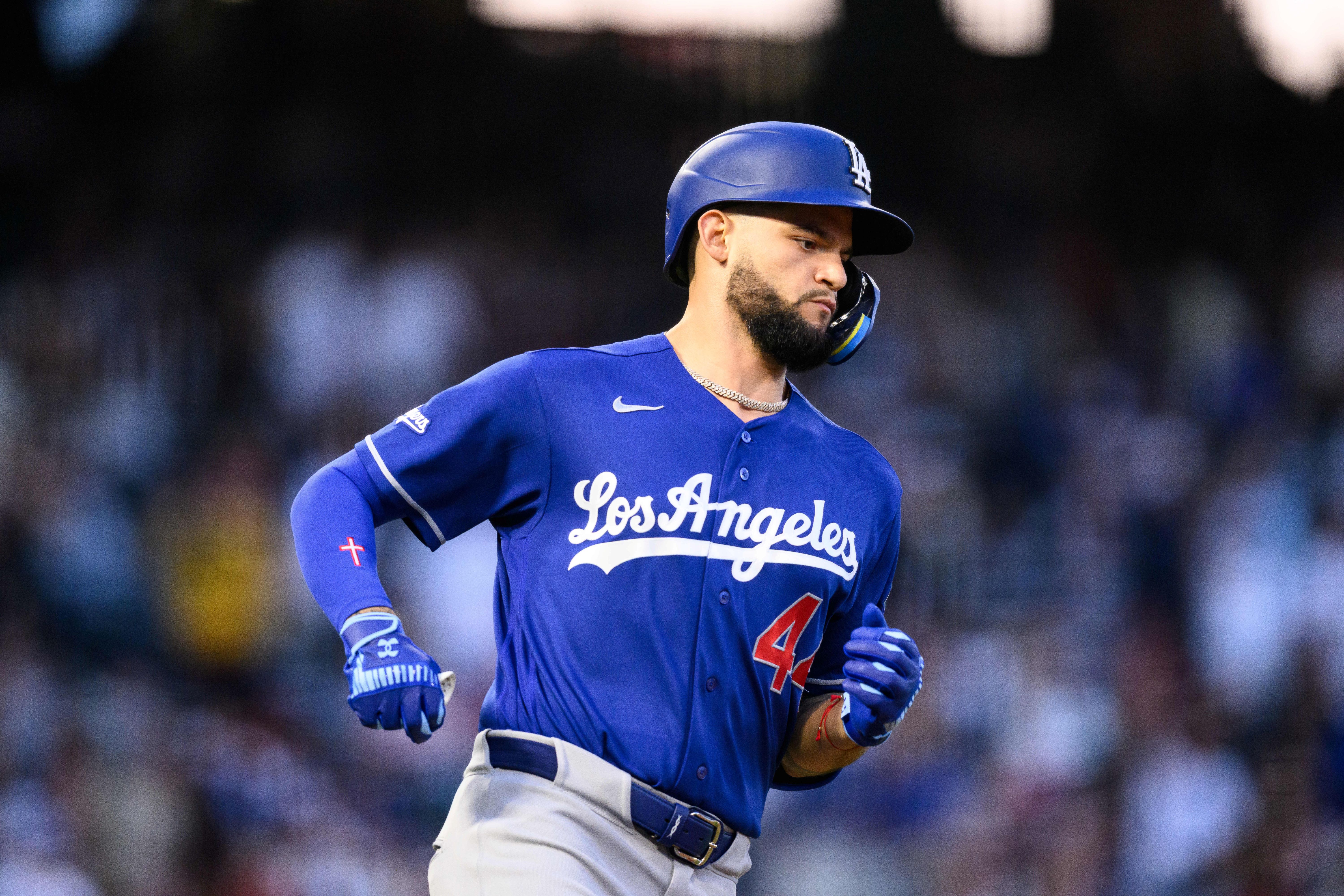 Los Angeles Dodgers center fielder Andy Pages (44), seen here running during a game, is featured in our home run predictions today.
