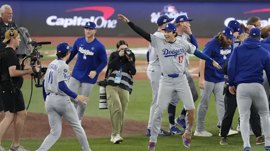 Los Angeles Dodgers two-way player Shohei Ohtani (17) and pitcher Roki Sasaki (11) celebrate as we break down the 2026 World Series odds.